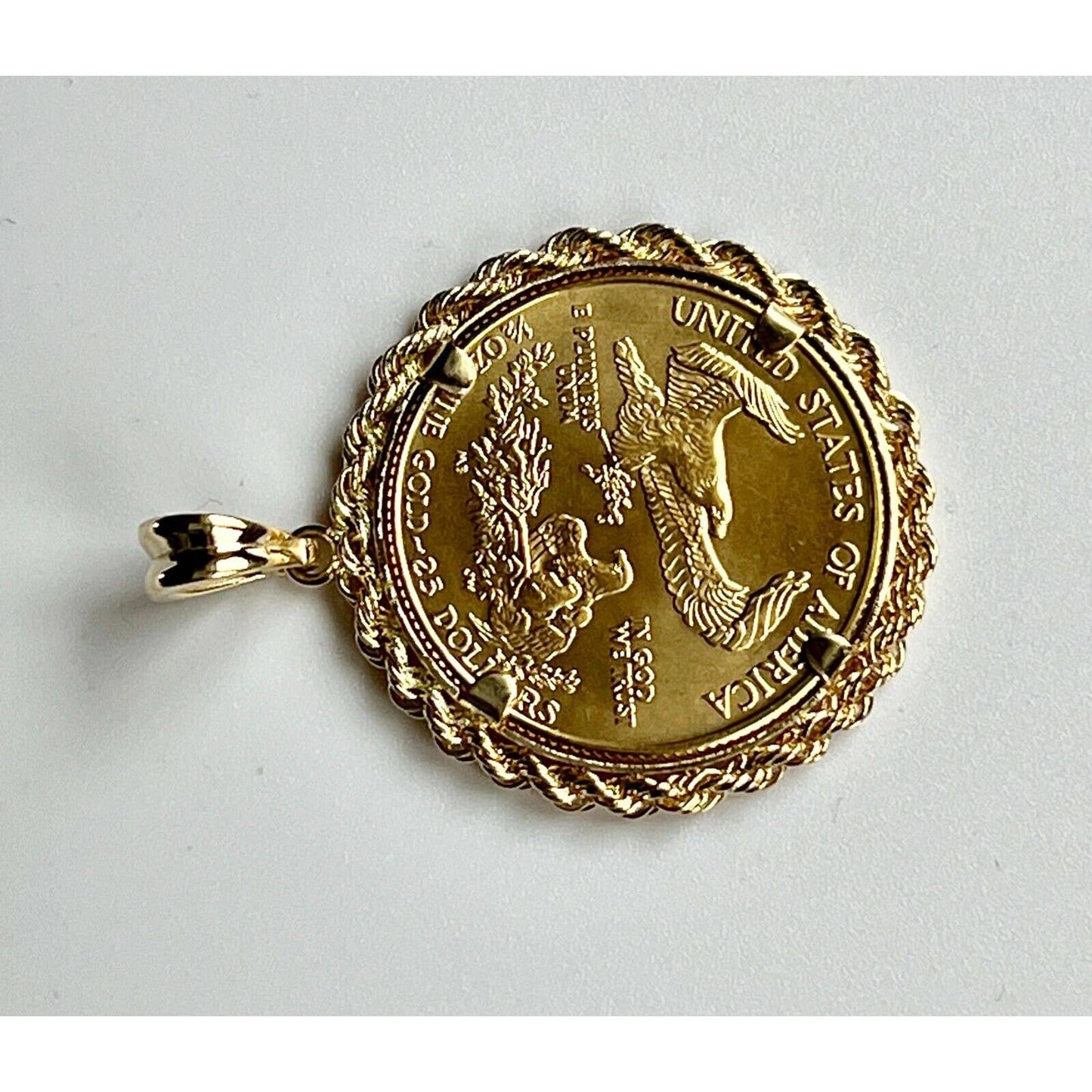 22k gold American Eagle 1/2 ounce coin mounted in 14k gold coin bezel
