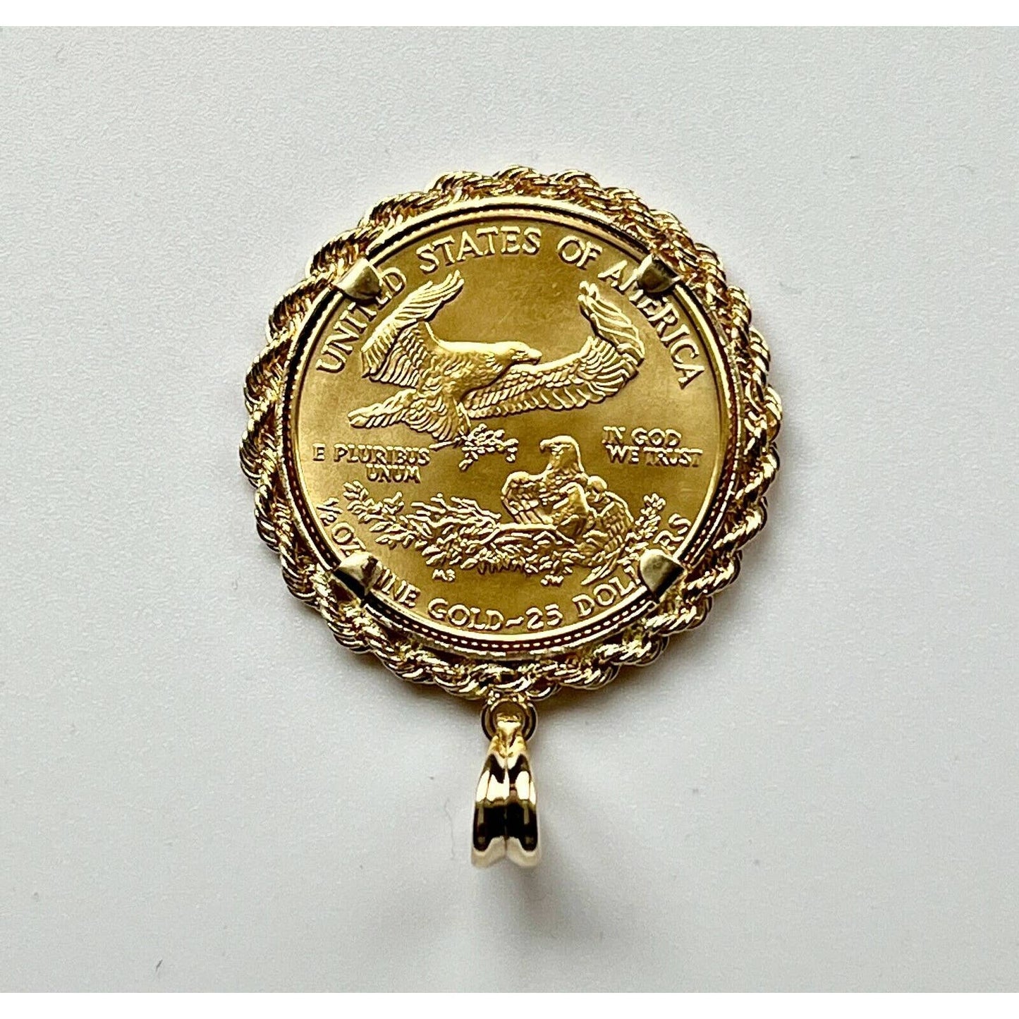 22k gold American Eagle 1/2 ounce coin mounted in 14k gold coin bezel
