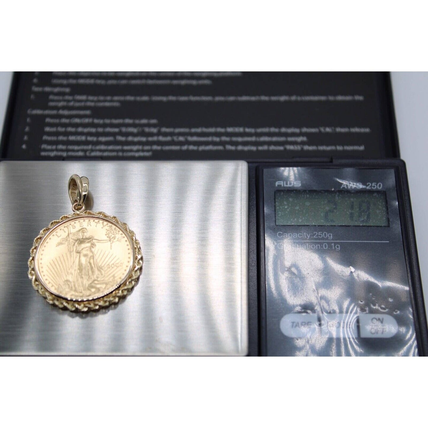 22k gold American Eagle 1/2 ounce coin mounted in 14k gold coin bezel