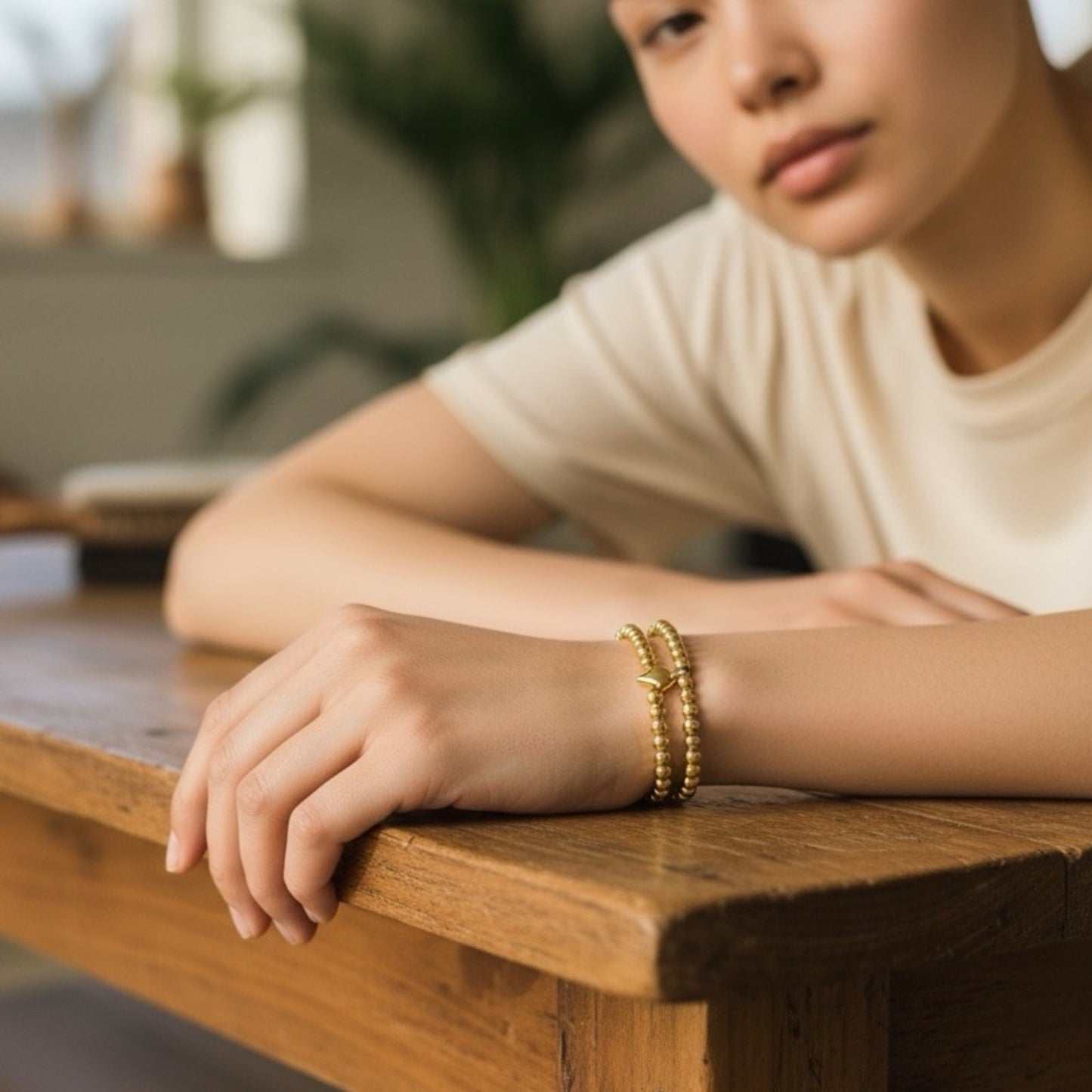 Stylish Gold Beaded Bracelet with heart charm