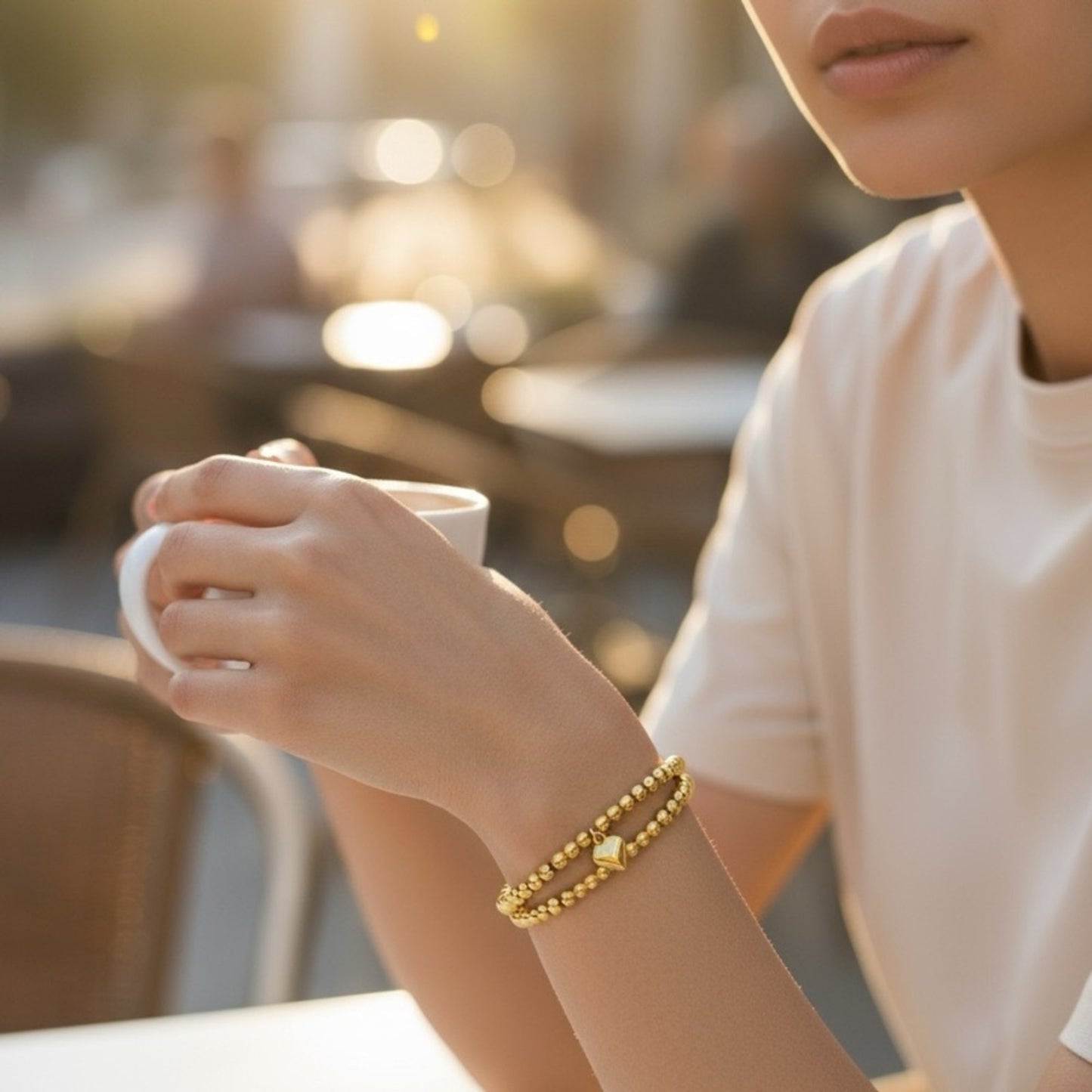 Stylish Gold Beaded Bracelet with heart charm
