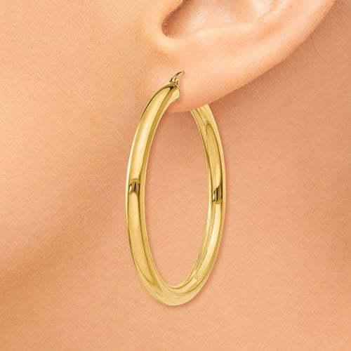 14k Yellow Gold 4mm Round Tube Hoop Earrings. 45mm Diameter.